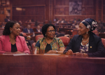 Kenyan women in parliamentary discussion